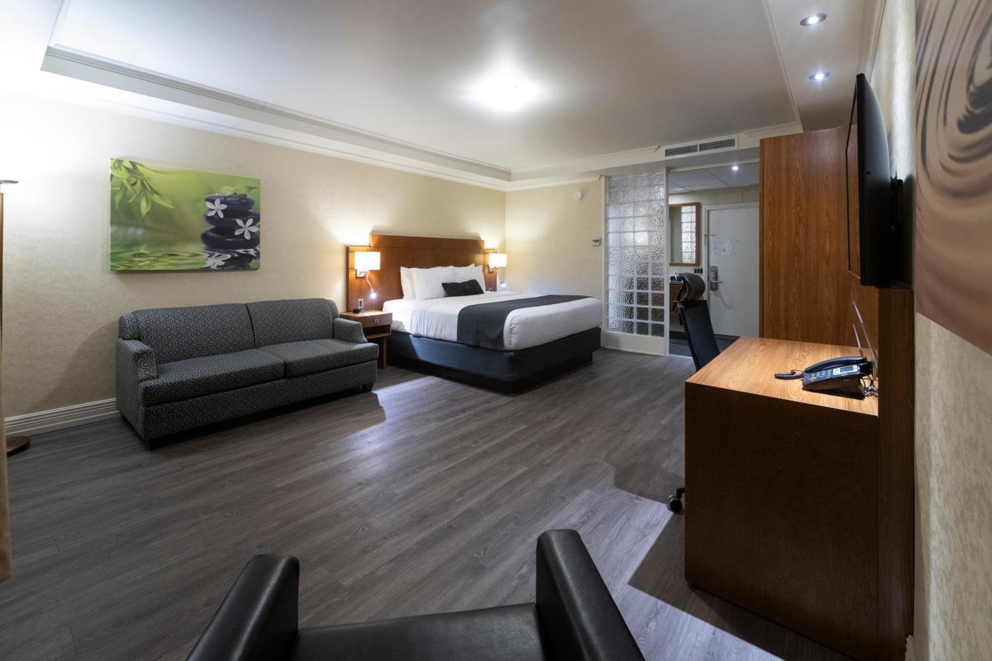 Hotel & Suites Le Dauphin דראמונדוויל מראה חיצוני תמונה